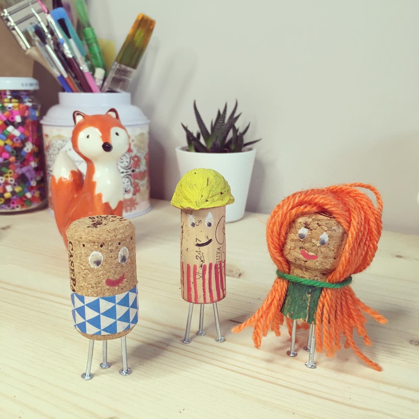 pupazzetti con i tappi
